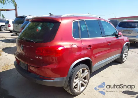 2012 Volkswagen Tiguan Sel z USA, uszkodzony, nr VIN WVGAV7AX0CW101188